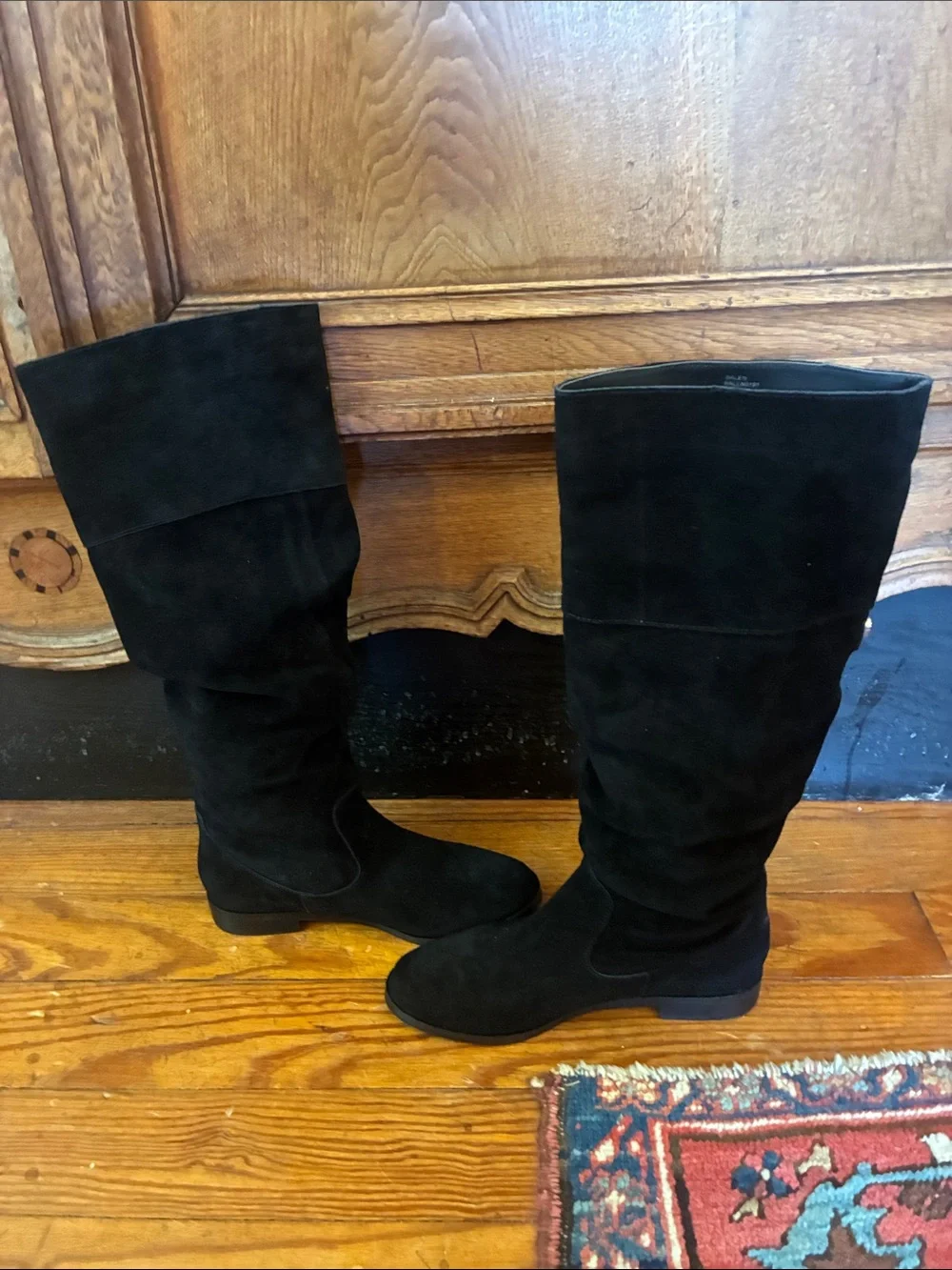 Steve Madden Balen black suede knee-high boots, featuring a relaxed slouch shaft